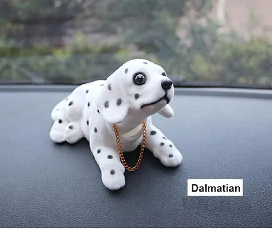 Small wobbling dog ornament for desk or car
