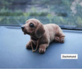 Wobbling dog car decoration for dashboard or desk